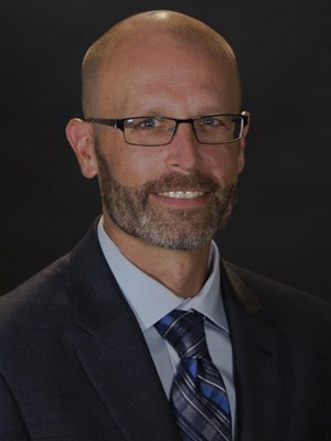 Head Coach Riley Woldt